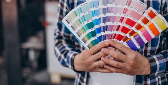 man-working-printing-house-with-paper-paints (1)